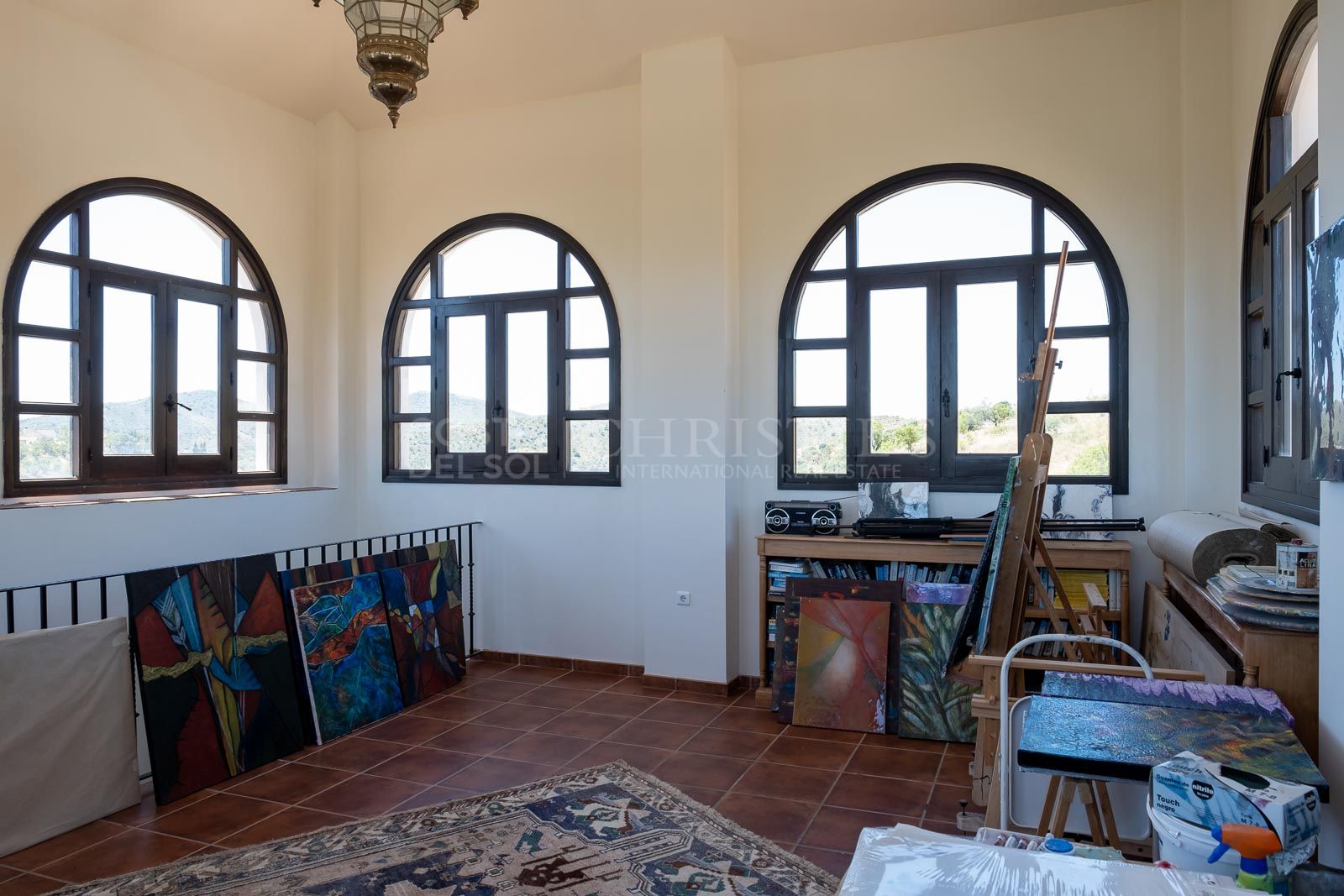 A comfortable living room, bar, dining room and terrace